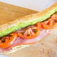 Florence Sandwich · Baguette, tomato, mozzarella, capers, red onion, prosciutto ham, fig glaze, basil.