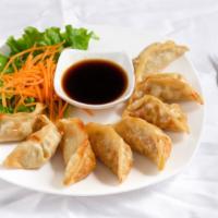 (8Pcs) Gyoza · Steamed or fried dumplings with chicken or pork mixed with vegetables - Served with a side o...