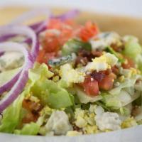 Chop Chop Salad · Mixed greens with bacon, tomato, bleu cheese crumbles, red onion, croutons and chopped egg t...