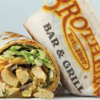 Queso Chicken Wrap · Grilled chicken, our famous queso sauce, with a blend of cheese, lettuce, fried corn tortill...