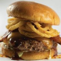 Smokehouse Burger · Hand-patty topped with bacon and covered with sweet BBQ sauce, cheddar cheese, and tumblewee...