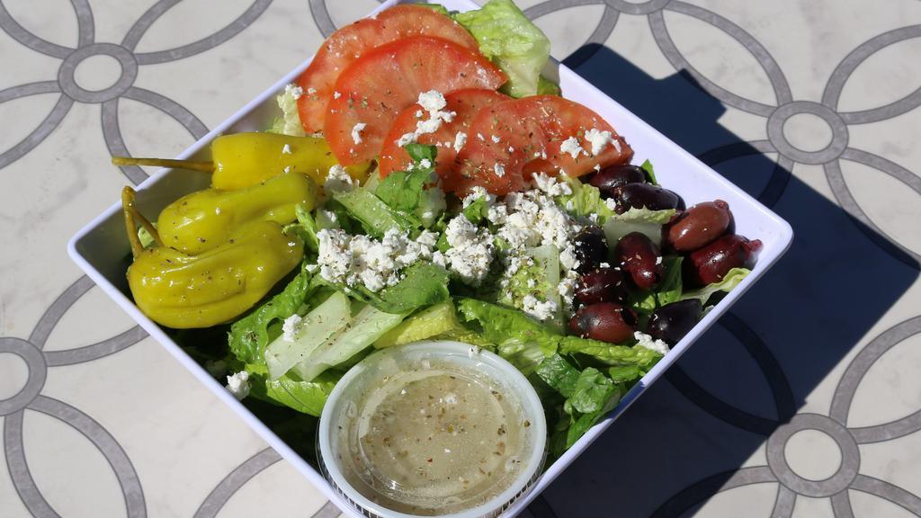 Mediterranean Salad · Comes with lettuce, tomatoes, kalamata olives, feta cheese, pepperoncini peppers, dressing.