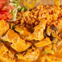 Pollo Al Chipotle · Chicken cooked with chipotle sauce. Spicy.
