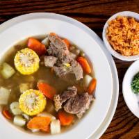Caldo De Res · Beef and vegetables stew. Served with a side of rice and tortillas.