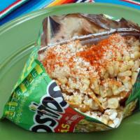 Tosti-Esquites · Comes with Corn Kernels, Queso Cotija, Chile Powder, Mayo, Lemon, Tostios Chips.