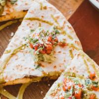 Quesadilla · Large Griddled Flour Tortilla, Asadero Cheese, Classic Guak
Add a Protein: Chicken Tinga, Po...