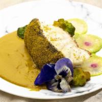 Seared Sea Bass · Ambotik sauce, mango dust, pickled mushrooms