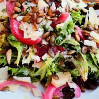 House Green Salad · Field greens, herbs, pickled red onions, toasted pepitas, shaved parmesan and choice of dres...