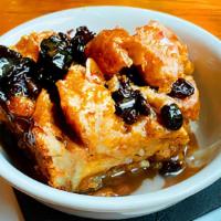 Bread Pudding · Caramel Custard Pudding topped with a Bourbon Créme Anglaise and Salted Caramel