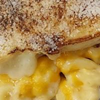 Mac And Cheese · MAC AND CHEESE, SWISS, PROVOLONE CHEESE, BACON ON PARMESAN CRUSTED WHITE BREAD