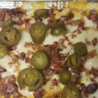 Loaded Fries · FRIES WITH MOZZARELLA AND CHEDDAR CHEESE, BACON BITS, AND OPTIONAL JALAPENOS