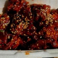 Sesame Chicken · Spicy. Deep fried chicken smothered with sesame seeds in a special spicy sauce.