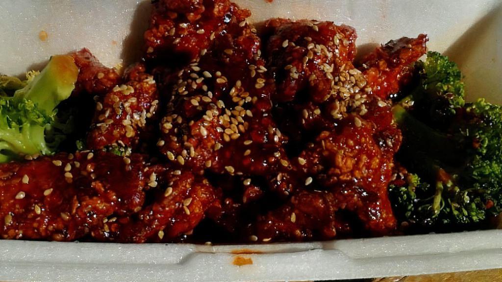 Sesame Chicken · Spicy. Deep fried chicken smothered with sesame seeds in a special spicy sauce.