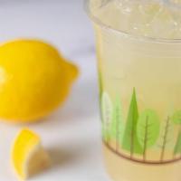 Ginger Lemonade · A thirst-quenching beverage served over ice. Made with cold-pressed lemon juice, organic raw...