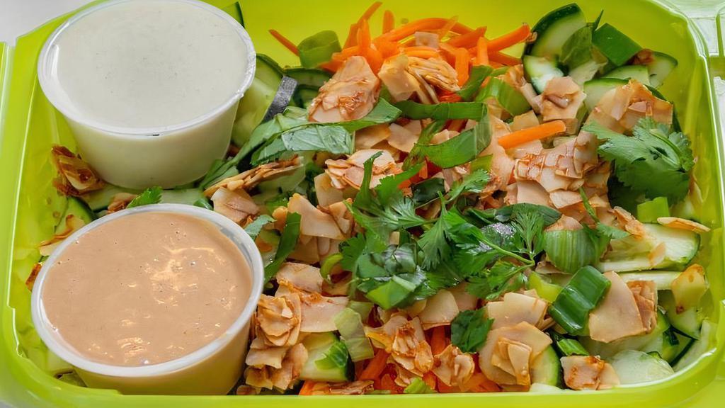 Thai Bowl · Steamed red rice and quinoa topped with cucumber, zucchini, carrot, and bits of ginger and scallions.  Topped with lime juice, basil, cilantro, mighty Thai sauce, zesty serrano dressing, and coconut maple chips.