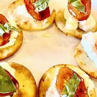 Basil Tomato Cheese Crackers · Fresh tomato comes with balsamic dressing.