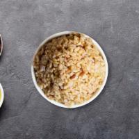 Steamed Brown Rice · Side of steamed brown rice.