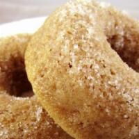 Cinnamon & Sugar Donuts · Sweeten your day with these tender donuts dressed in cinnamon and sugar. Contains eggs.