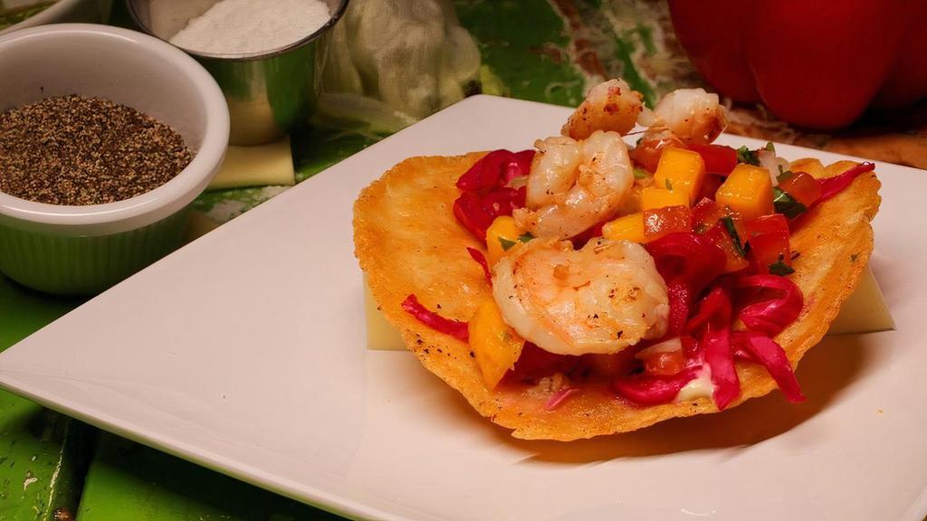 Shrimp Taco · Grilled Shrimp marinated in Garlic, Lime, Red Cabbage, Spices & Mango Salsa