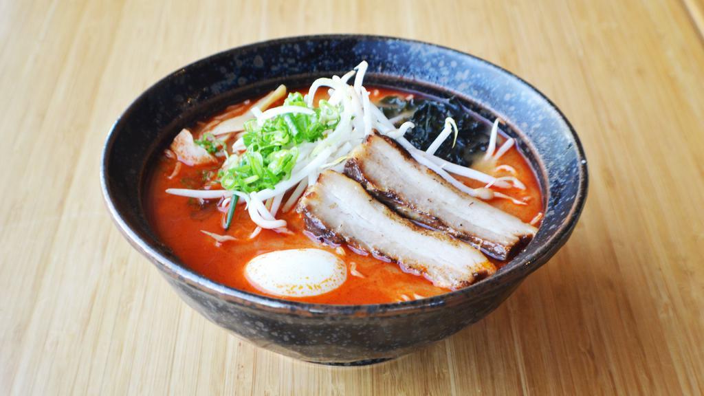 Spicy Miso · Miso base, tonkotsu broth, chashu pork, bean sprout, wakame, bamboo shoots,scallion, soft boiled egg, noodles.