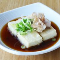 Agedashi Tofu ( Gf ) · Fried tofu, seven spices, scallion, bonito flakes.
*can be vegan without bonito flakes.