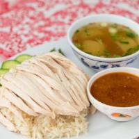 Chicken And Rice (Khao Man Gai) · Thai Chicken & Rice (Mary's Chicken) served with Nong's sauce, cucumbers, cilantro, and a si...
