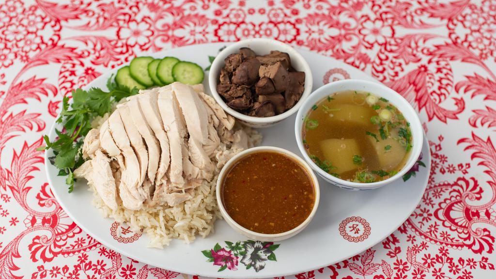 Piset (Large) Chicken And Rice (Khao Man Gai) · Big size Chicken and rice with Nong's sauce. Comes with chicken livers (optional).