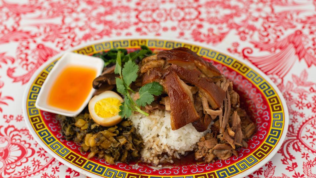Pork & Rice (Khao Kha Muu) · Pork Hog (Carlton’s Farm) braised in coca cola, coco powder, Thai and Chinese herbs and spice on Jasmine rice, pickle mustard greens, and boiled egg with pickle Thai chili sauce. (Cannot be made gluten-free)