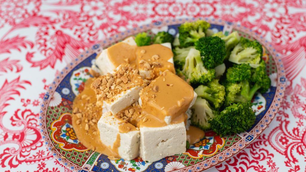 Tofu Peanut  · Steamed OTA Tofu and steamed broccoli serve on jasmine rice with Nong's Peanut sauce (GF/Vegan).
