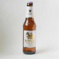 Singha Beer · 11.2 FL. oz. premium Thai lager.