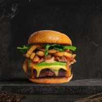 Fried Favorite Vegan Burger · Impossible patty grilled and topped with fries, avocado, and caramelized onions. Served on a...