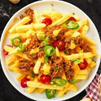 Make It Impossible Loaded Vegan Fries · Impossible meat, tomatoes, onions, melted vegan cheese, and jalapenos topped on Idaho potato...