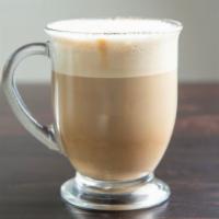 Cappuccino · Capomo espresso, steamed milk, and lots of milk foam.