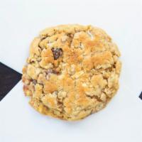 Trash Bag Cookie · Chocolate, white chocolate, butterscotch, almonds, raisins & coconut all baked into an oatme...