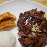 Beef Teriyaki · Served with rice and salad.