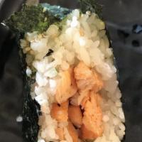 Grilled Salmon Onigiri · Sushi laid top of rice.