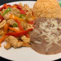 Chicken Fajitas · Chicken w/ bell pepper, onion served with Rice & Beans.