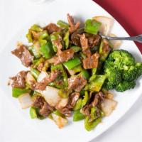 Pepper Onion Beef 青椒牛 · Beef with green pepper nd onion in our brown sauce.