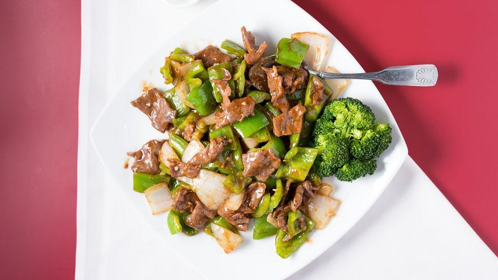 Pepper Onion Beef 青椒牛 · Beef with green pepper nd onion in our brown sauce.