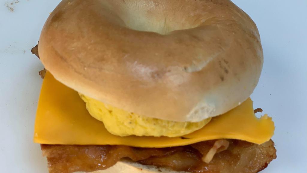 Bacon Egg And Cheese  · Toasted bagel with egg cheese and bacon