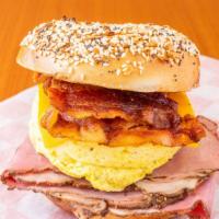 Pastrami, Bacon, Egg & Cheese · Toasted bagel with Pastrami, Bacon, egg and cheese.