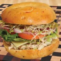 Tuna · sandwich come with mayo, mustard, cheese, lettuce, tomato, onion, pickles, sprouts, and avoc...