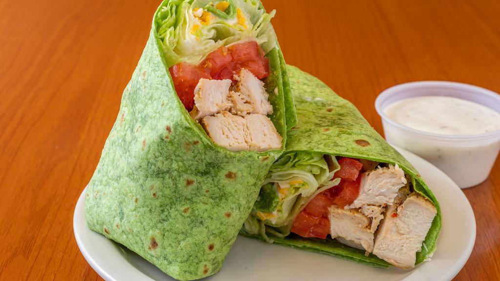 Sarah’S Wrap · Homemade grilled chicken, cheese, lettuce, tomato, avocado&ranch dressing on tortilla wrap.