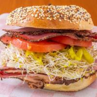 Belly Buster · Bagel w/ double pastrami, cheese, greek pepper, tomato & sprouts.