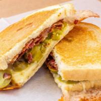 Jalapeño Grilled Cheese  · Monterey Jack cheese melted with cream cheese, jalapeño, caramelized onion, and bacon on sou...