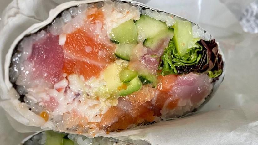 Rainbow · Ahi tuna, atlantic salmon, yellowtail, cucumber, avocado, crab salad, masago with spicy aioli, wasabi aioli and eel sauce.