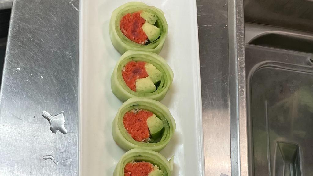 Spicy Tuna Naruto · Fresh Cucumber wrap with spicy tuna and avocado.
