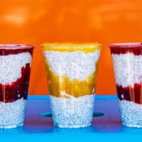 Parfait Cup · Creamy coconut, chia seeds, shredded coconut, and agave layered with either mango or strawbe...