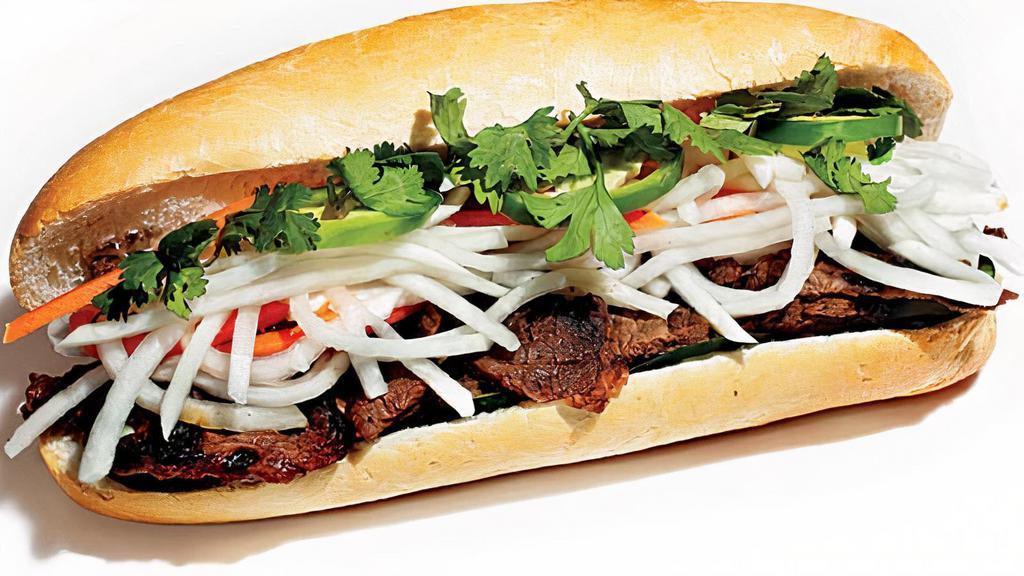 Sandwich - Bánh Mì · Mini French baguette, homemade mayonnaise, pickled vegetables, cucumber, jalapenos, cilantro, and soy sauce. Choice of grilled chicken, fried egg, grilled pork, tofu. Add grilled beef for an additional charge.