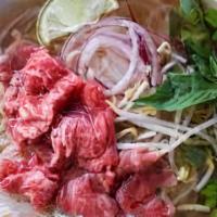 Sliced Steak Phở - Phở Tài · Traditional.

Rare steak is served undercooked. Consuming raw or uncooked meat may increase ...